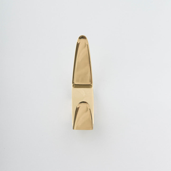 Modernist brass hook made in Toronto.