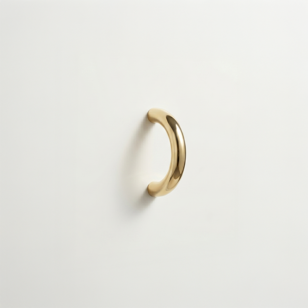 The Charlie Arc Pull is a 3-inch round solid brass cabinet pull, available in 15 finishes and two profile depths.