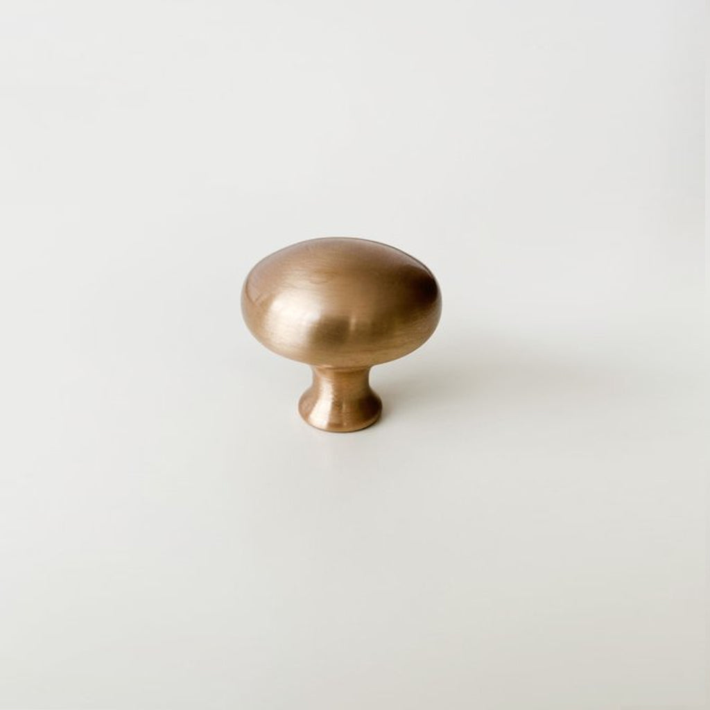 A CBH Charlie Finish Sample door knob on a white wall.