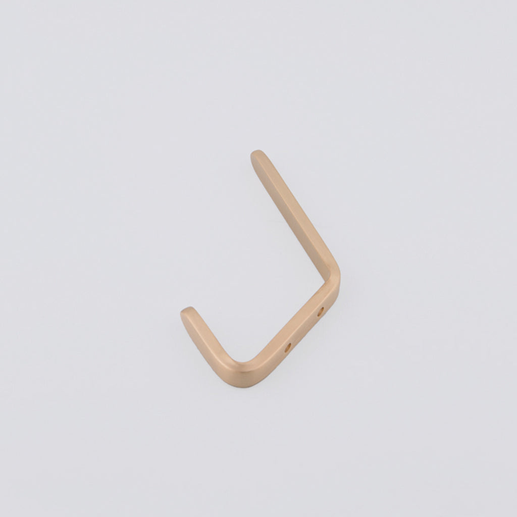 Brushed Brass Double Hook. Made in Toronto, Canada. On an angle.