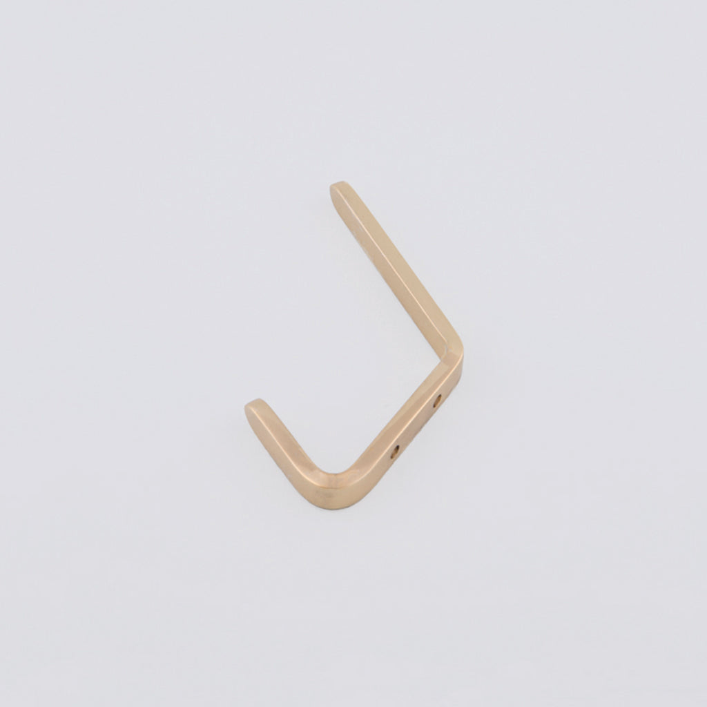 Brass Double Hook. Made in Toronto, Canada. On an angle.