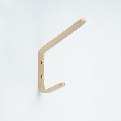 Brushed Brass Double Hook. Made in Toronto, Canada. On side.