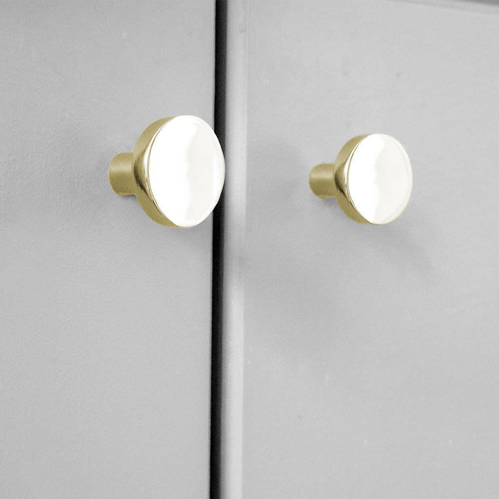 A close up of a door with two CBH Charlie Moon Knobs.