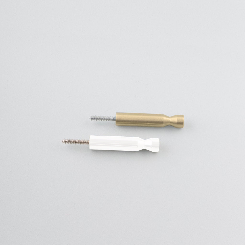 A couple of CBH Charlie Pencil Hooks sitting next to each other.