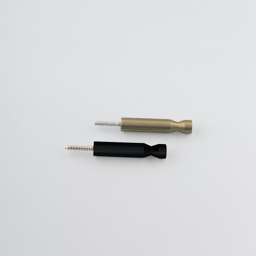 A couple of CBH Charlie Pencil Hooks sitting next to each other.