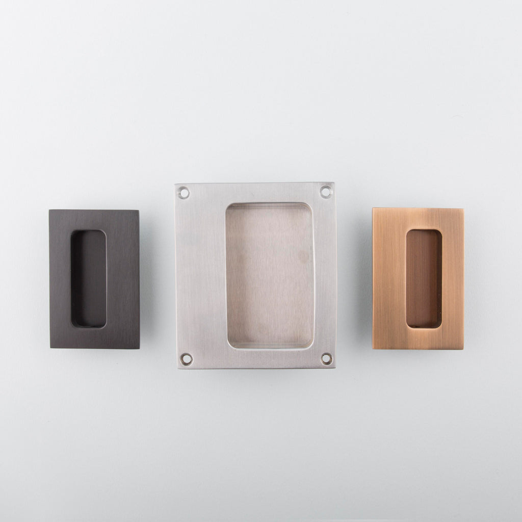 Collection of recessed flush pulls for cabinets. Hardware made in Toronto.