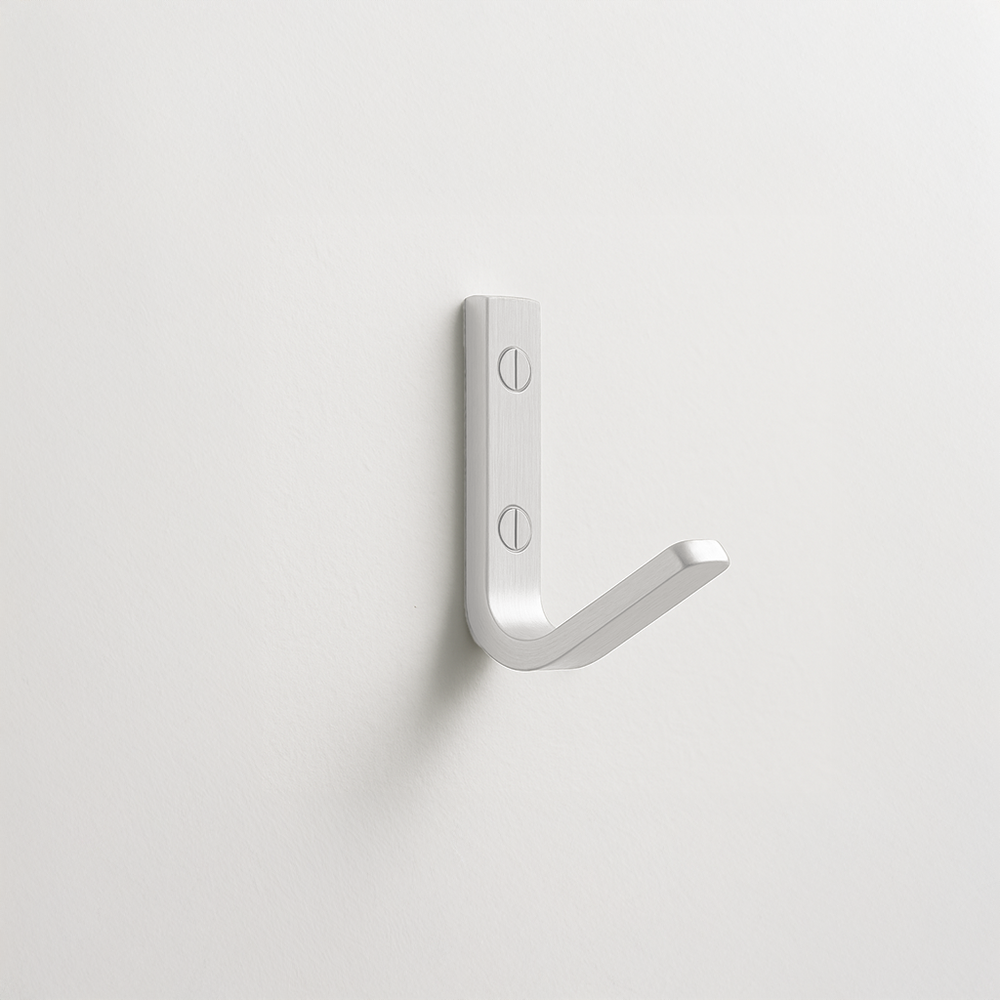 Satin nickel Charlie Single hook, a flat bar bent into a J-shape with two visible mounting screws, on a white wall.