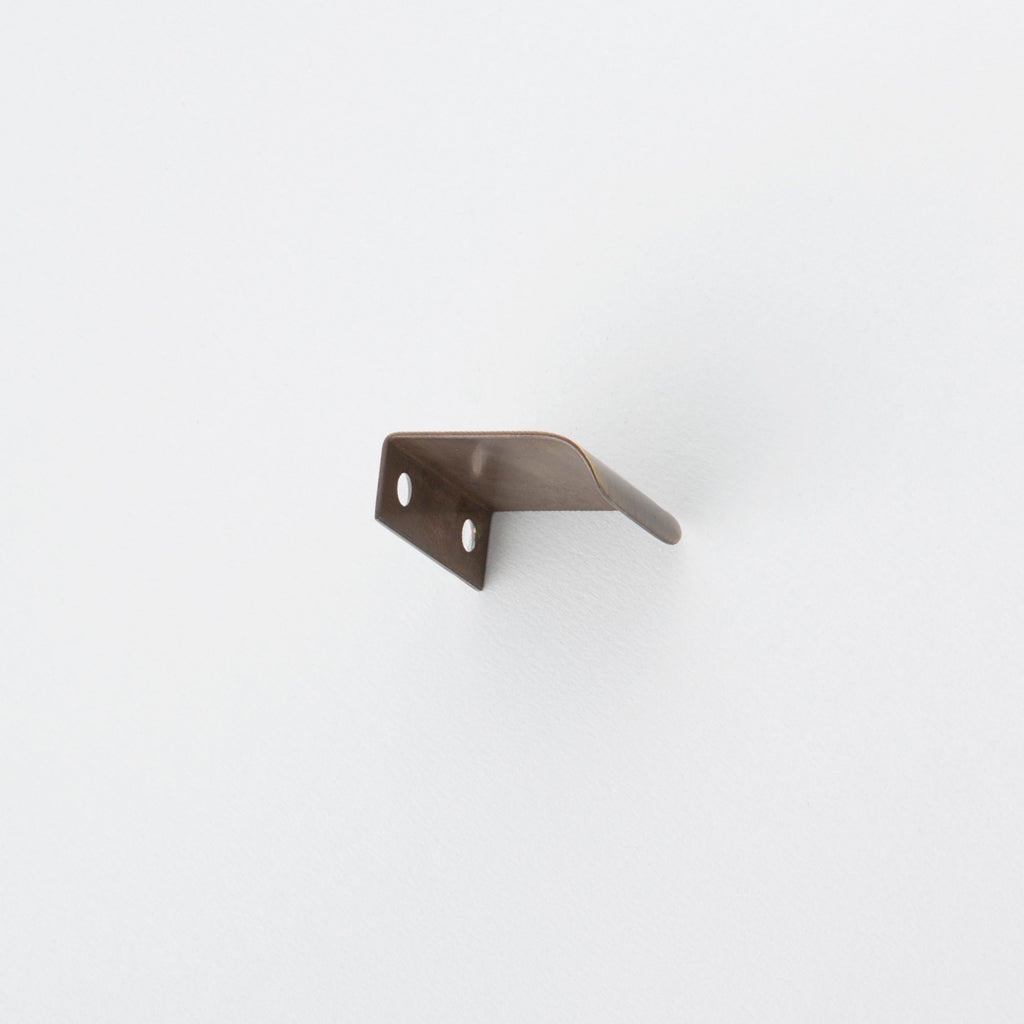 Side view of antique bronze tab pull for cabinets. Hardware made in Toronto.