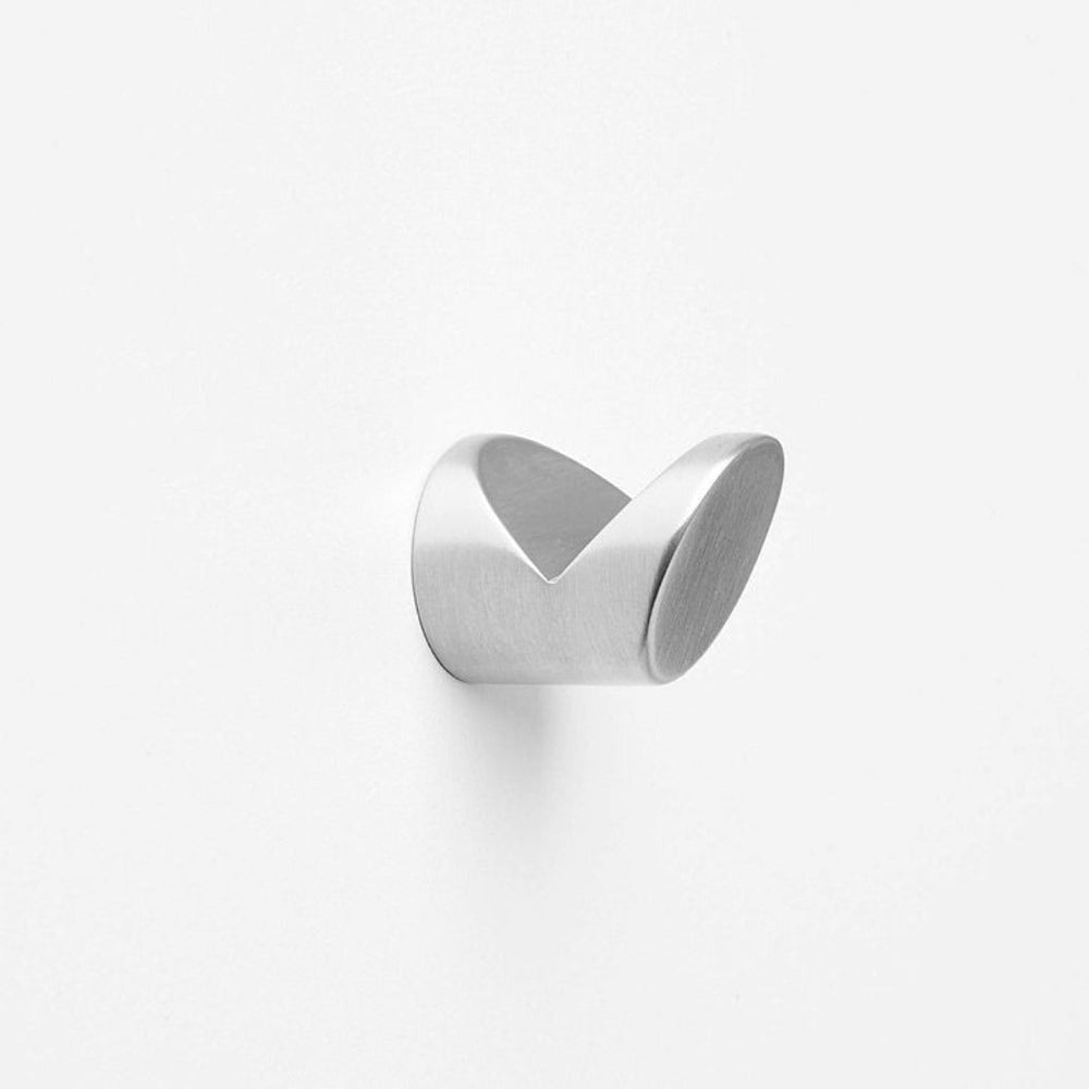 A CBH Charlie Wedge Hook on a white wall.