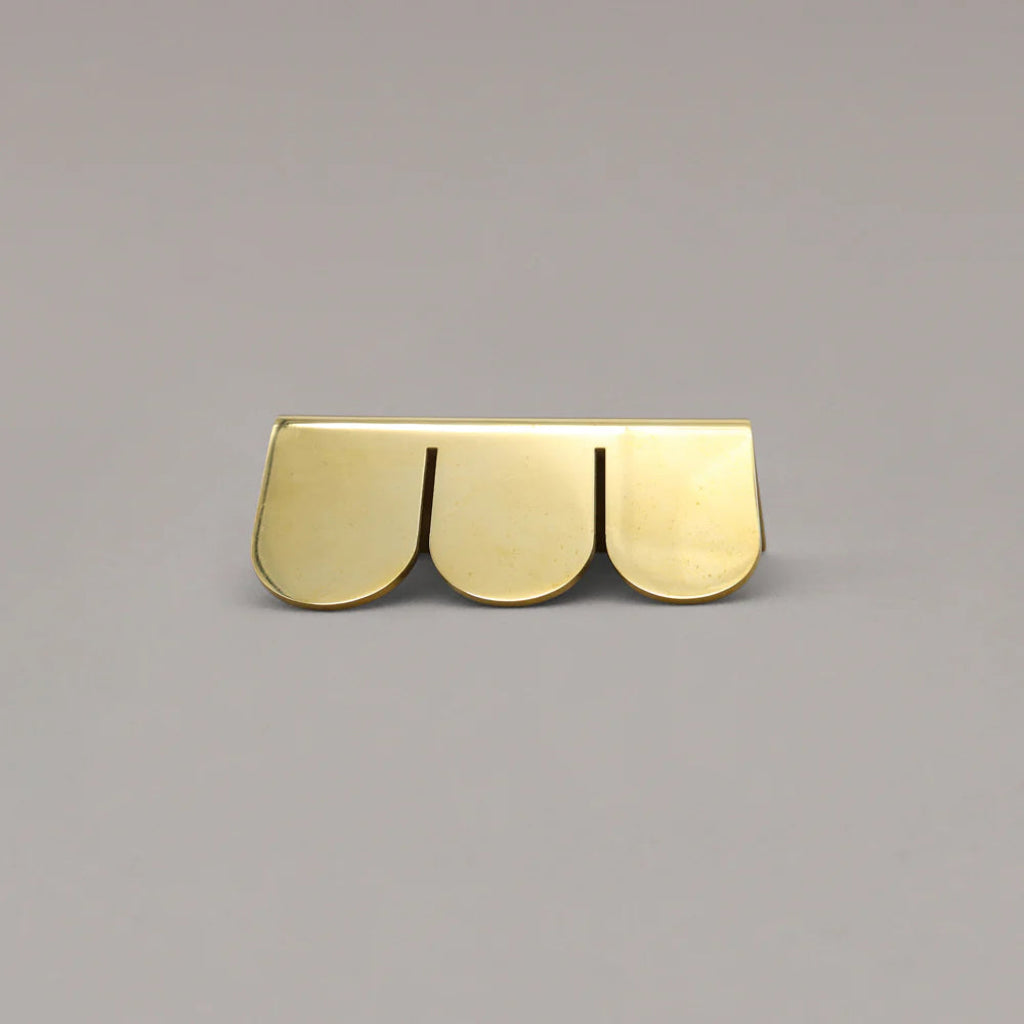 Upgrade your cabinetry with the Sweep Edge Pull, a solid brass edge pull featuring a soft curved profile for kitchens, bathrooms, wardrobes and furniture.
