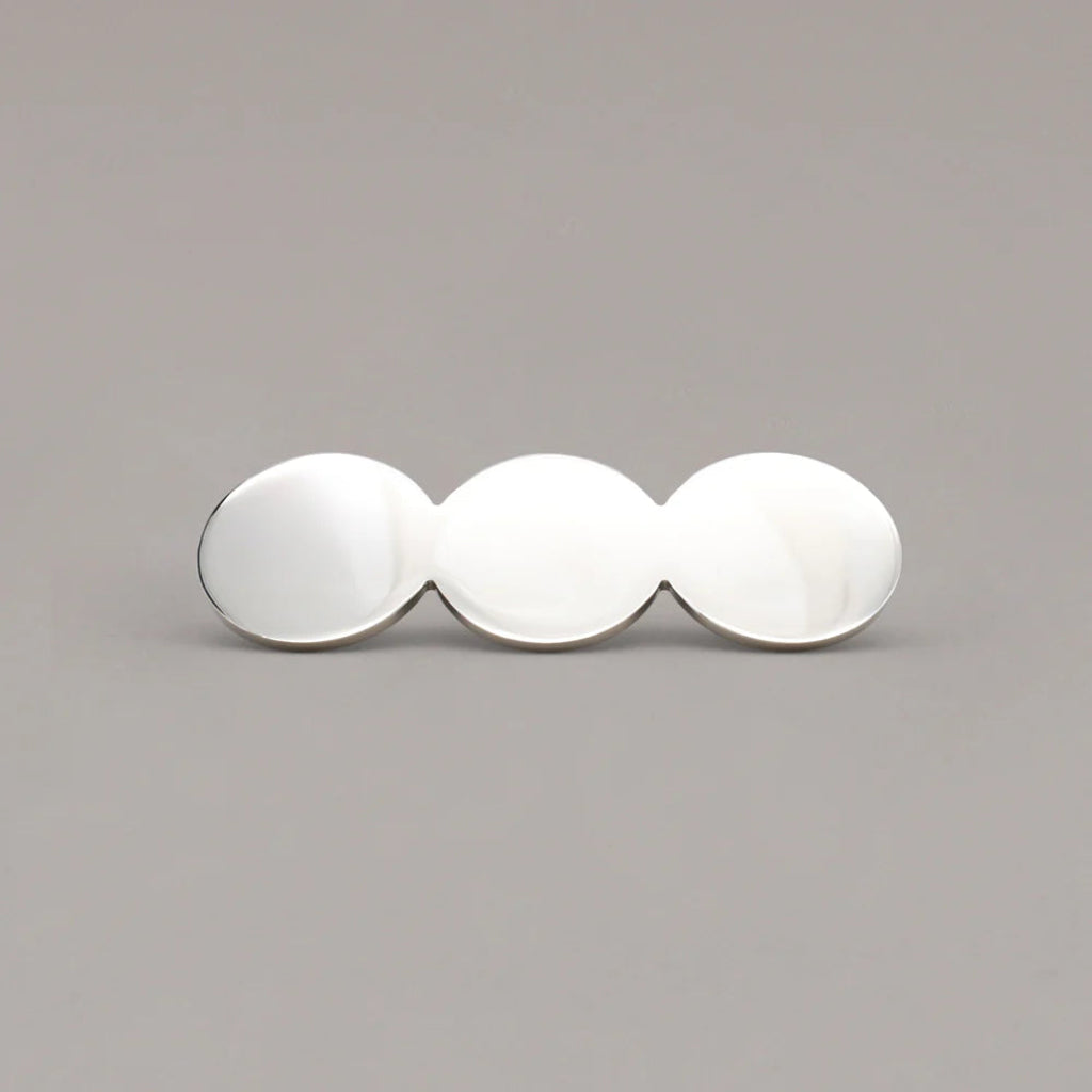 The Trio Pull features a sculptural three-circle design in solid brass. A modern cabinet pull for kitchens, bathrooms, wardrobes, and custom joinery.