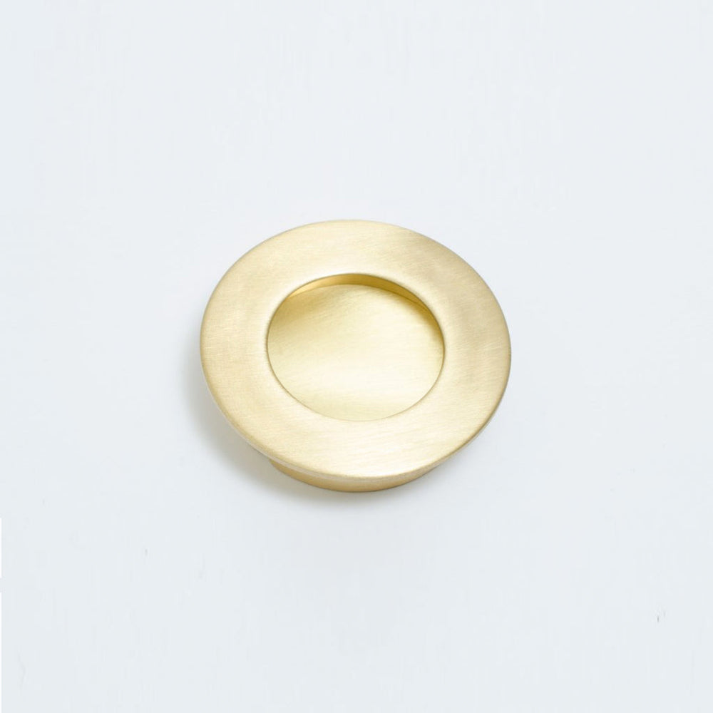 a Baccman Berglund Circle Flush Handle on a white background.