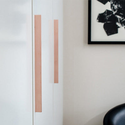 Beautiful and elegant copper handles on closet doors