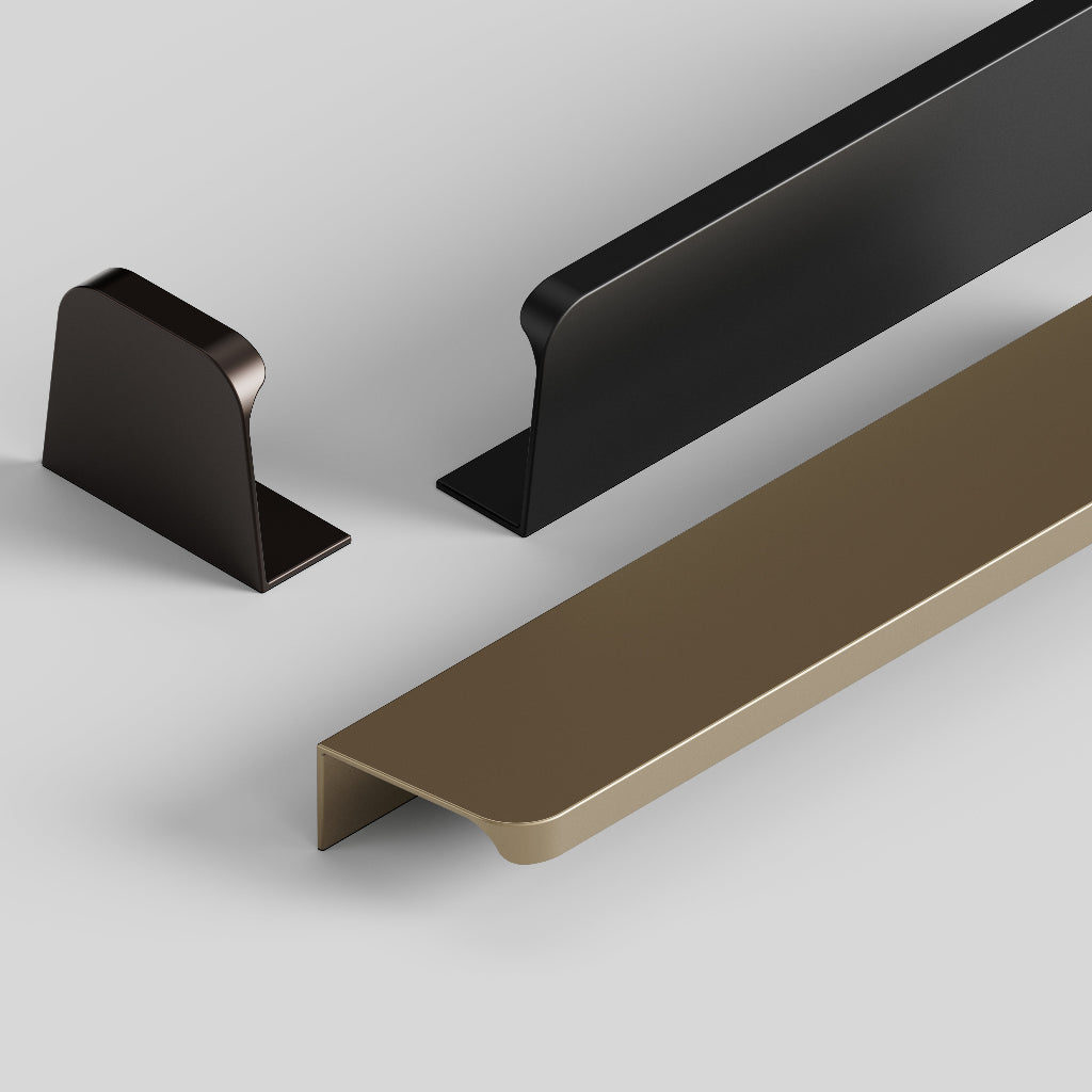 Furnipart Comet edge pulls in matte black, matte bronze, and matte brass, showing the wrap over profile.