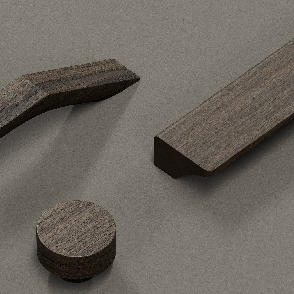 Dark brown oak Furnipart Row cabinet knob shown alongside matching dark brown oak handles.