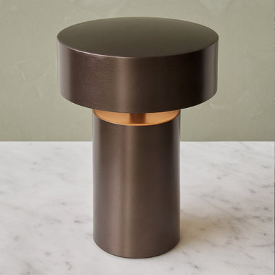A close up of an Audo Column LED Table Lamp on a table.