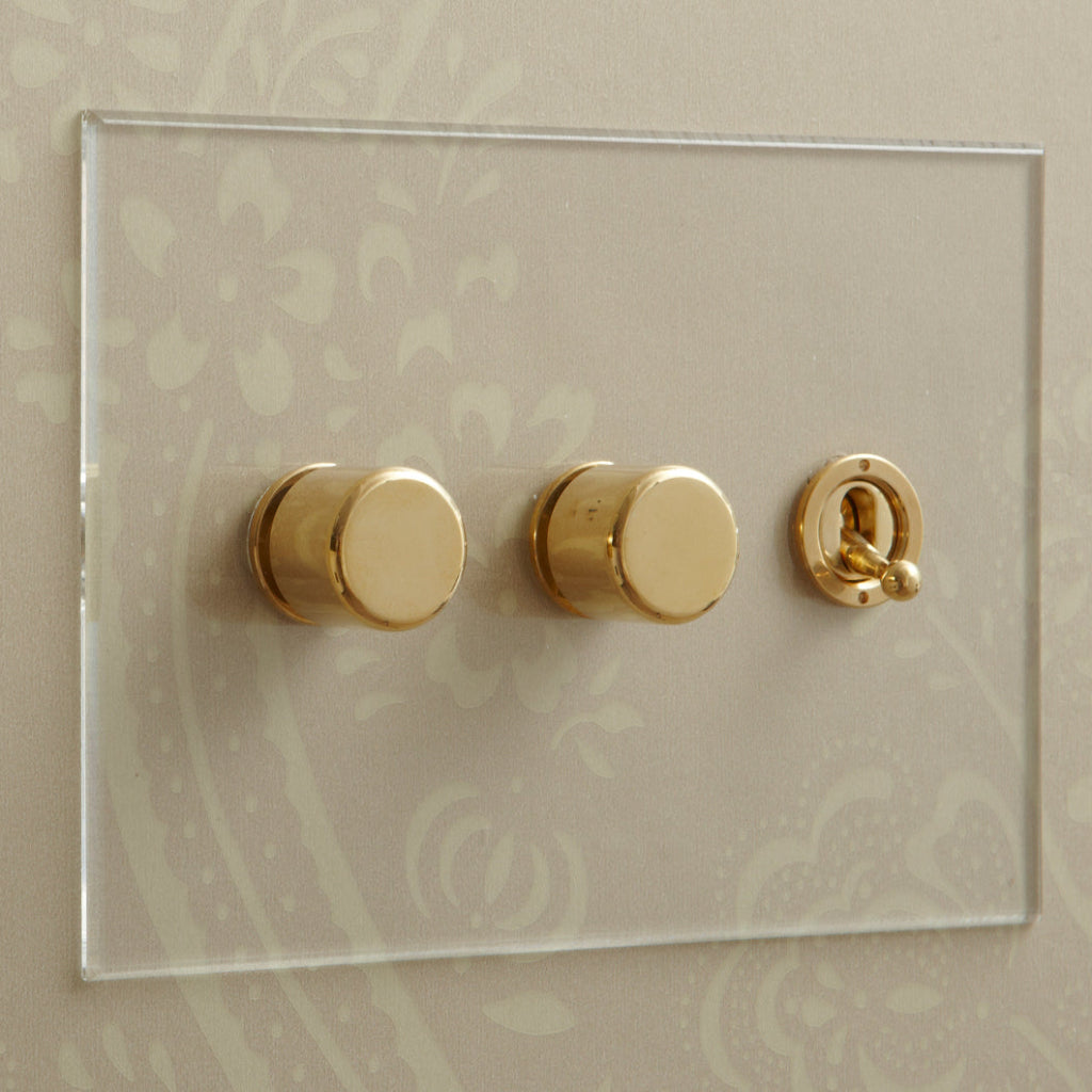 Invisible plate combination dimmer and toggle by Forbes & Lomax.