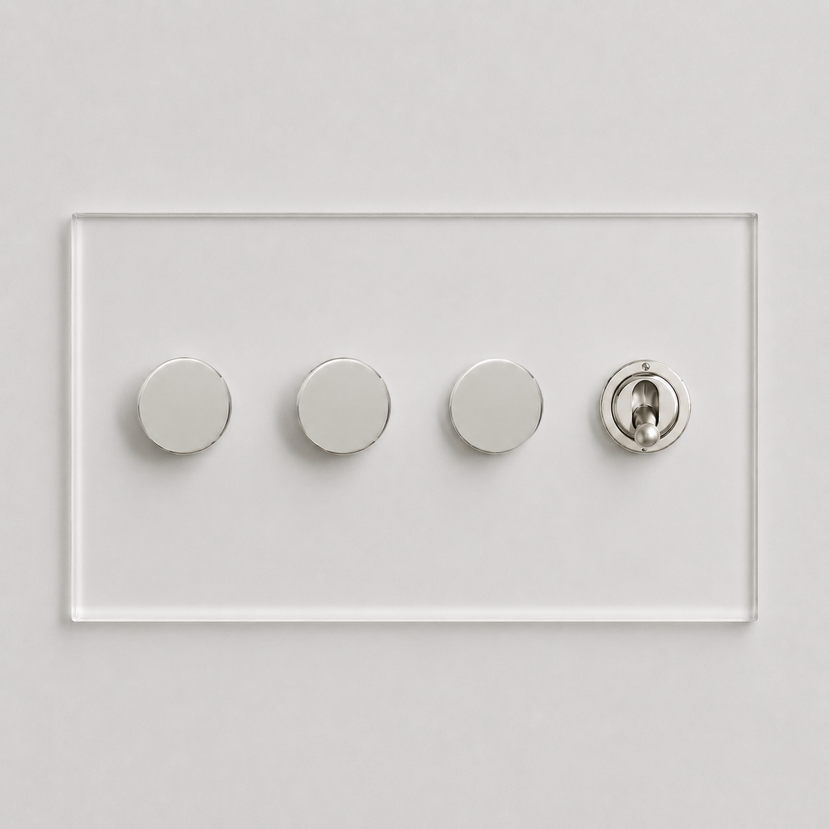 Forbes & Lomax invisible acrylic plate with three nickel rotary dimmers and one matching toggle switch.