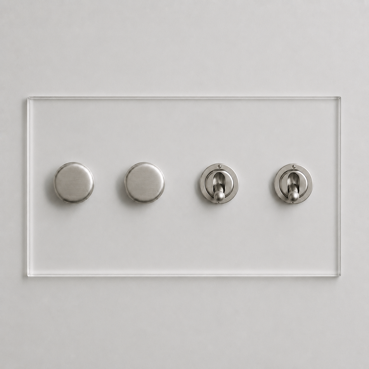 Forbes & Lomax invisible acrylic plate with two brushed nickel rotary dimmers and two matching toggle switches.