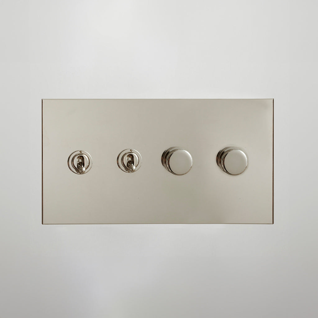 Nickel Forbes & Lomax switch plate with two toggles and two dimmers.