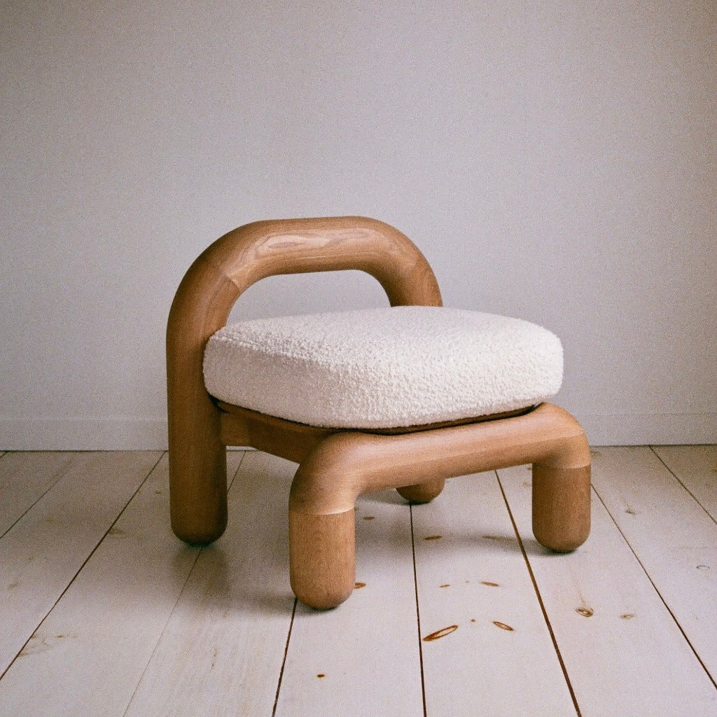 Lithic lounge chair in natural oak with cream upholstery