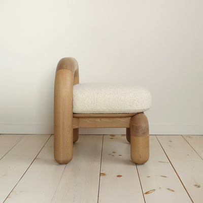 lithic lounge chair in natural oak with cream upholstery