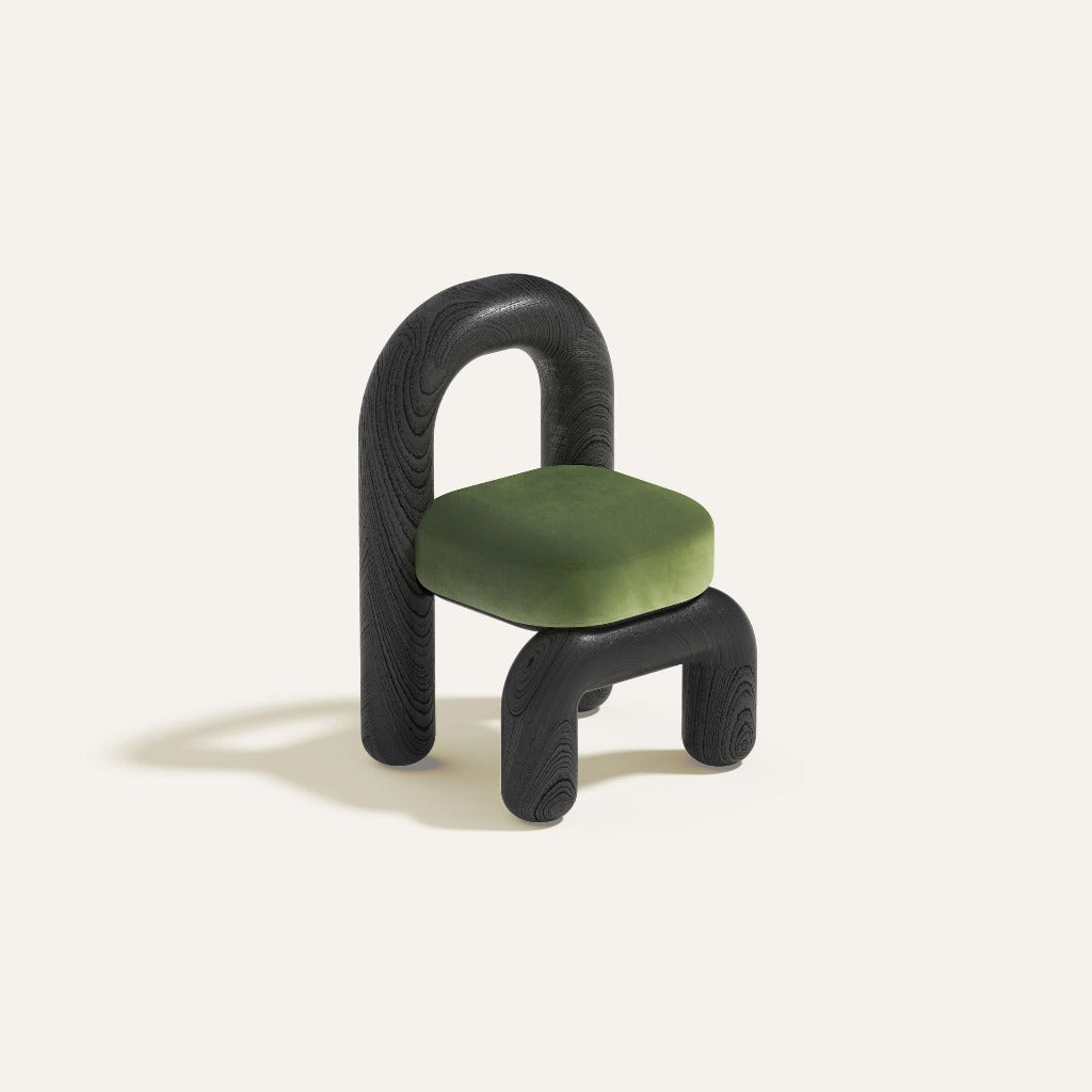 lithic dining chair in black oak with green velvet seat