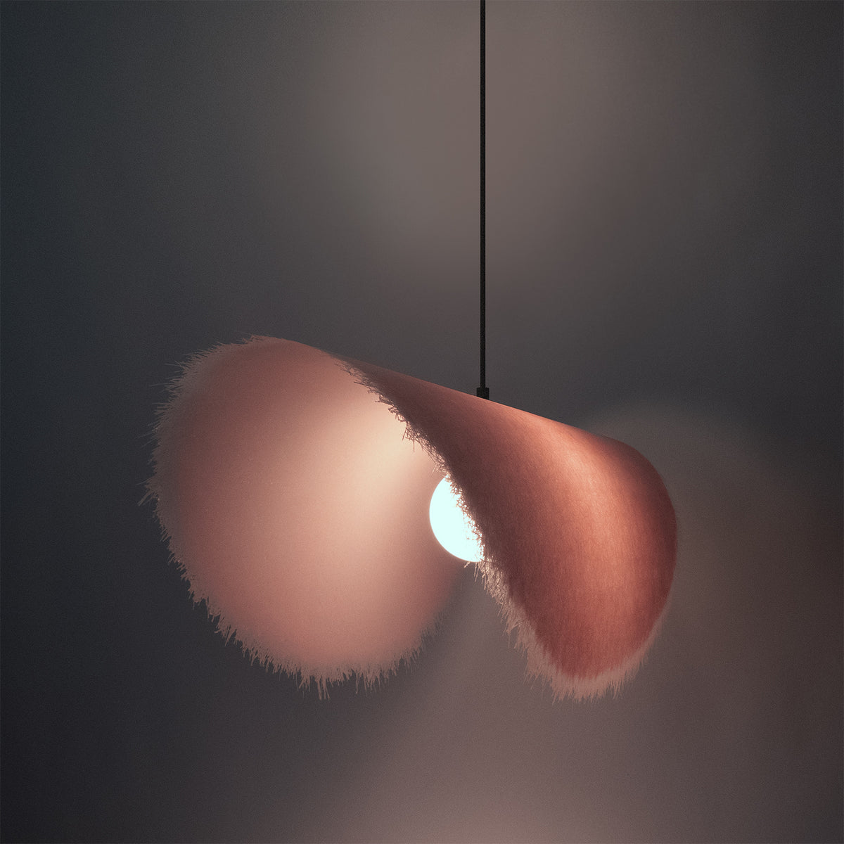 The Culotte Pendant Lamp adds poetic softness with its sculptural fiberglass shade, diffusing light with an ethereal glow and organic movement.