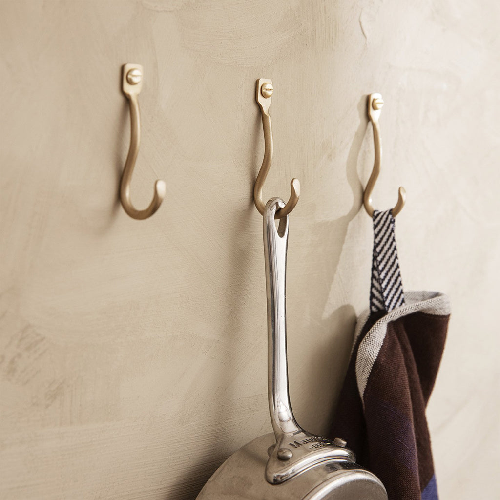 Curvature Hooks, set of 3, brass finish. Wall mounted.