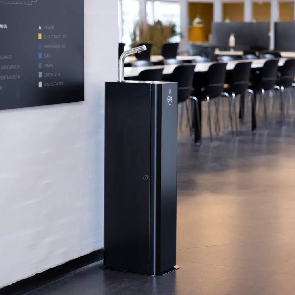 Dan Dryer COLUMN Hand Sanitizer Stand with touch-free sensor operation. Free-standing hygiene solution for schools, hospitals, retail and public spaces.