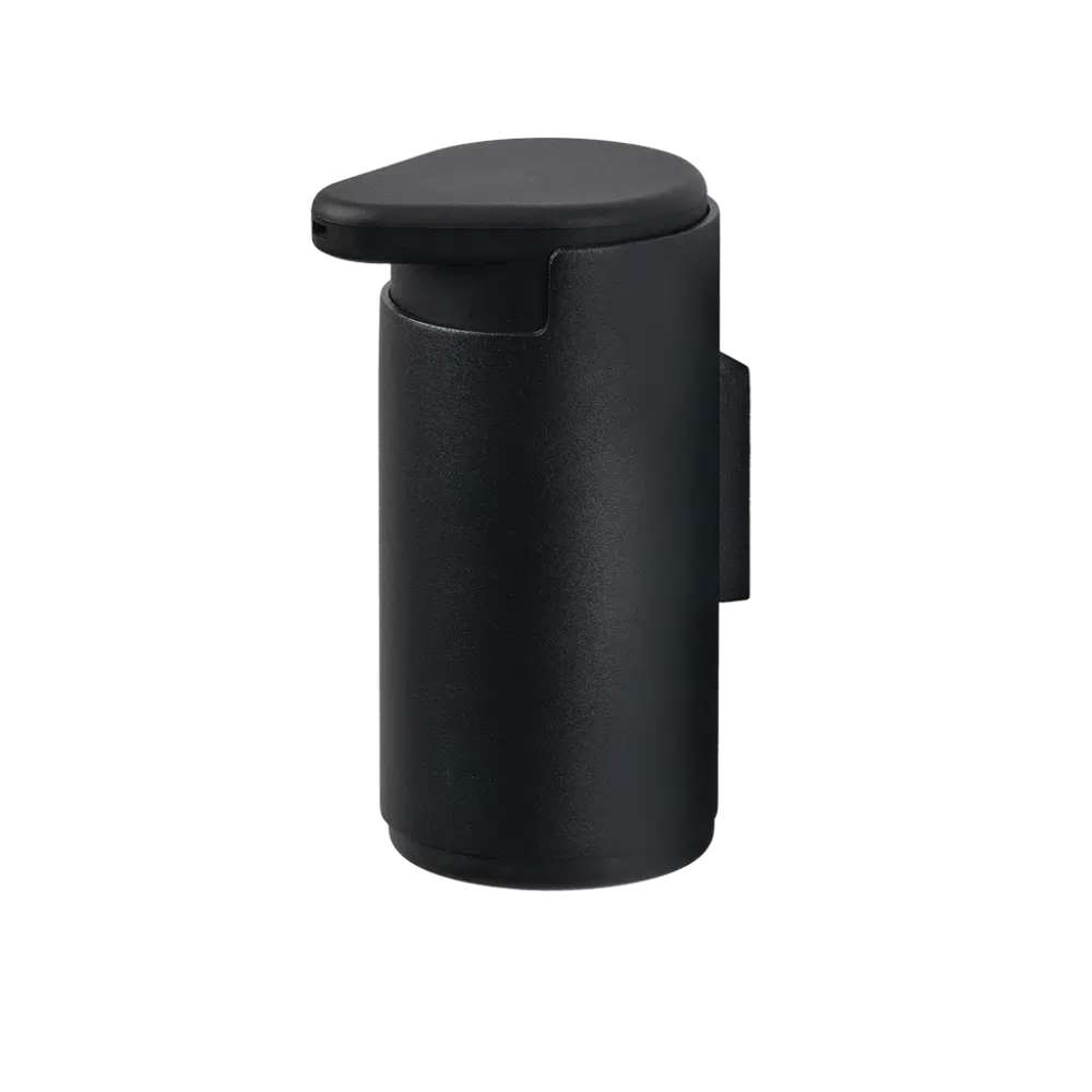 Black cylindrical soap pump on white background