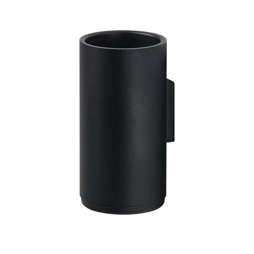 Black cylindrical toothbrush holder on white background