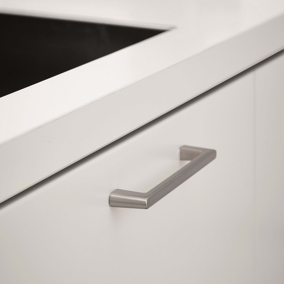 Inox look Furnipart Diner cabinet handle, 160 mm, on a white drawer under a white countertop.