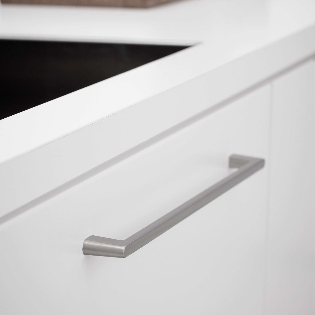 Inox look Furnipart Diner cabinet handle, 320 mm, on a white drawer under a white countertop.