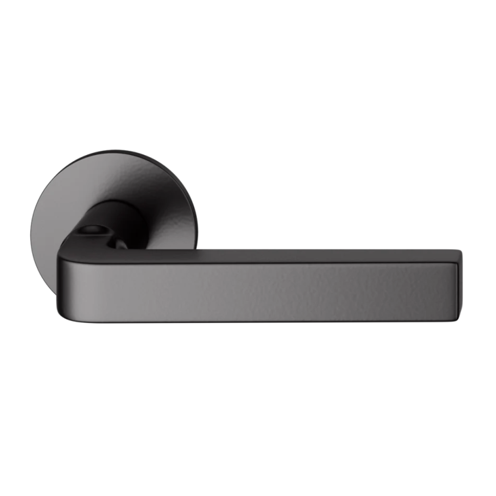 Black powder coat FSB 1004 door lever, a square-grip lever with an angled bend, on a round rose.