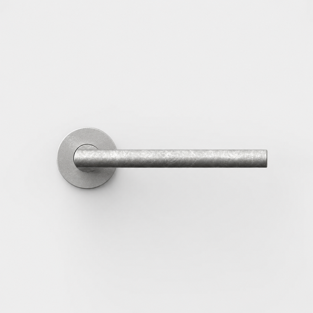 FSB 1035 architectural door lever in a textured silver finish with a minimalist, ergonomic cylindrical design.