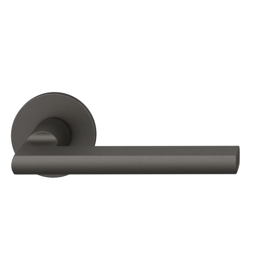 Dark bronze anodized FSB 1035 door lever, a flattened round-bar lever on a round rose.