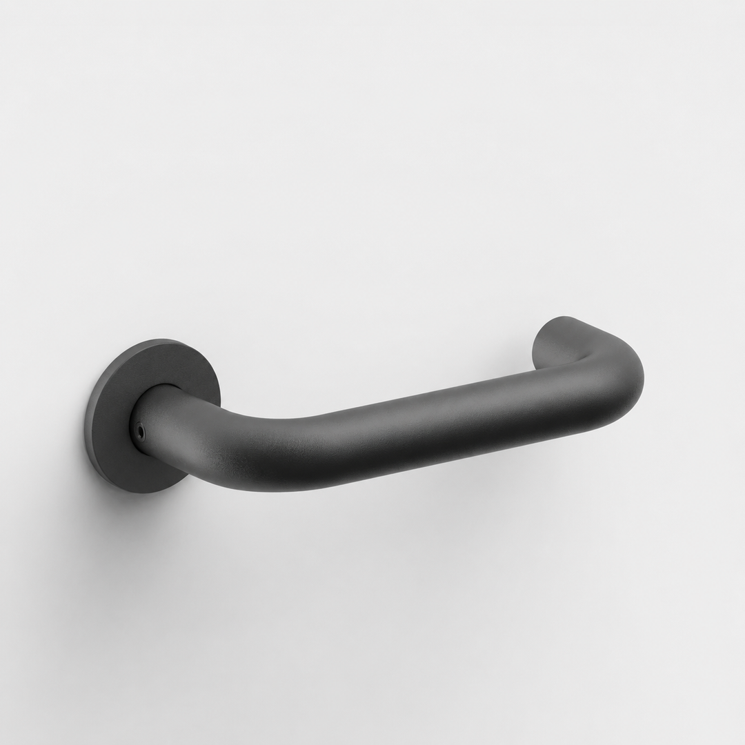 Matte black FSB 1070 U-shaped door lever with a closed return on a circular rose against a white background.