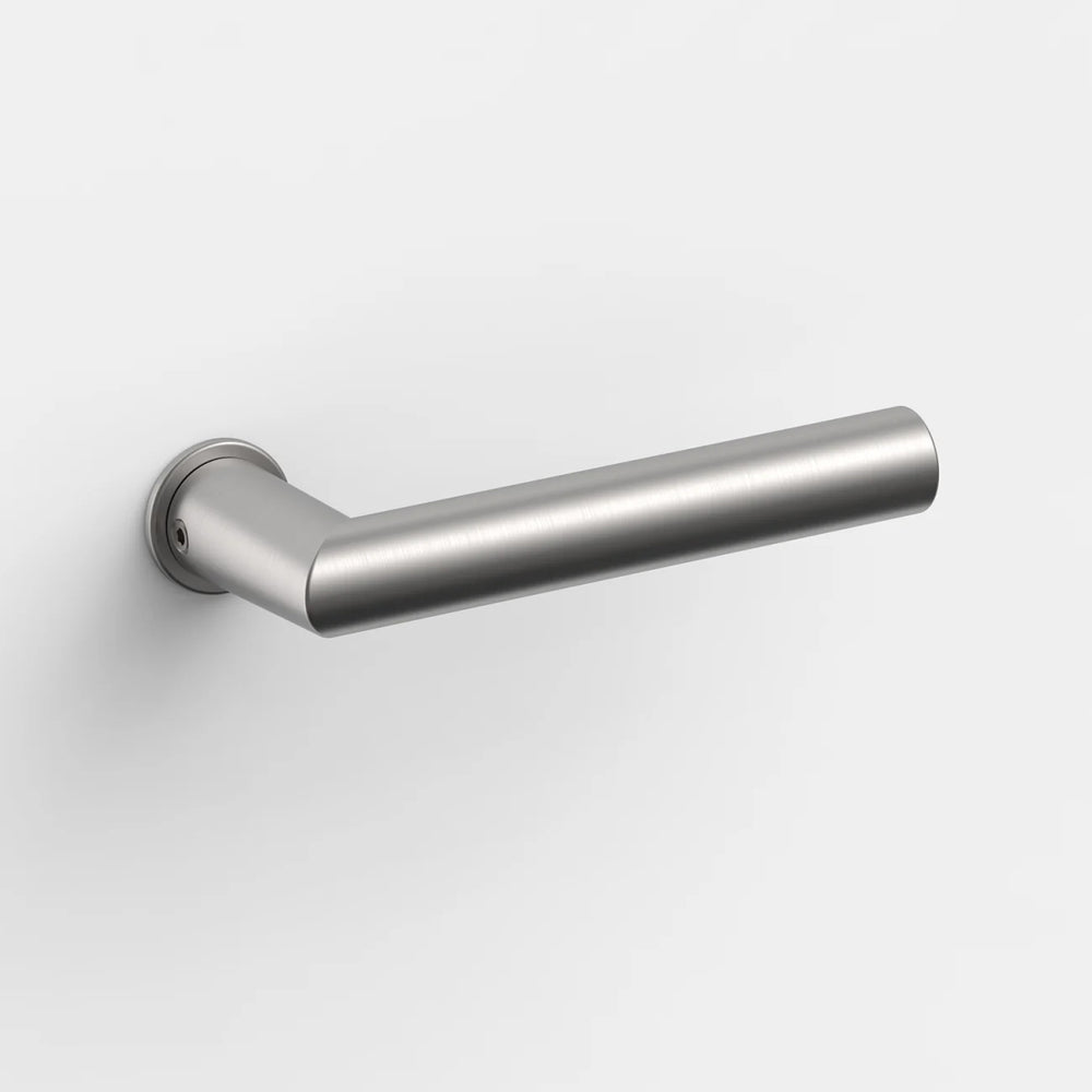 Satin stainless steel FSB 1076 door lever seen head-on, showing the mitred square-section bar and round rose.