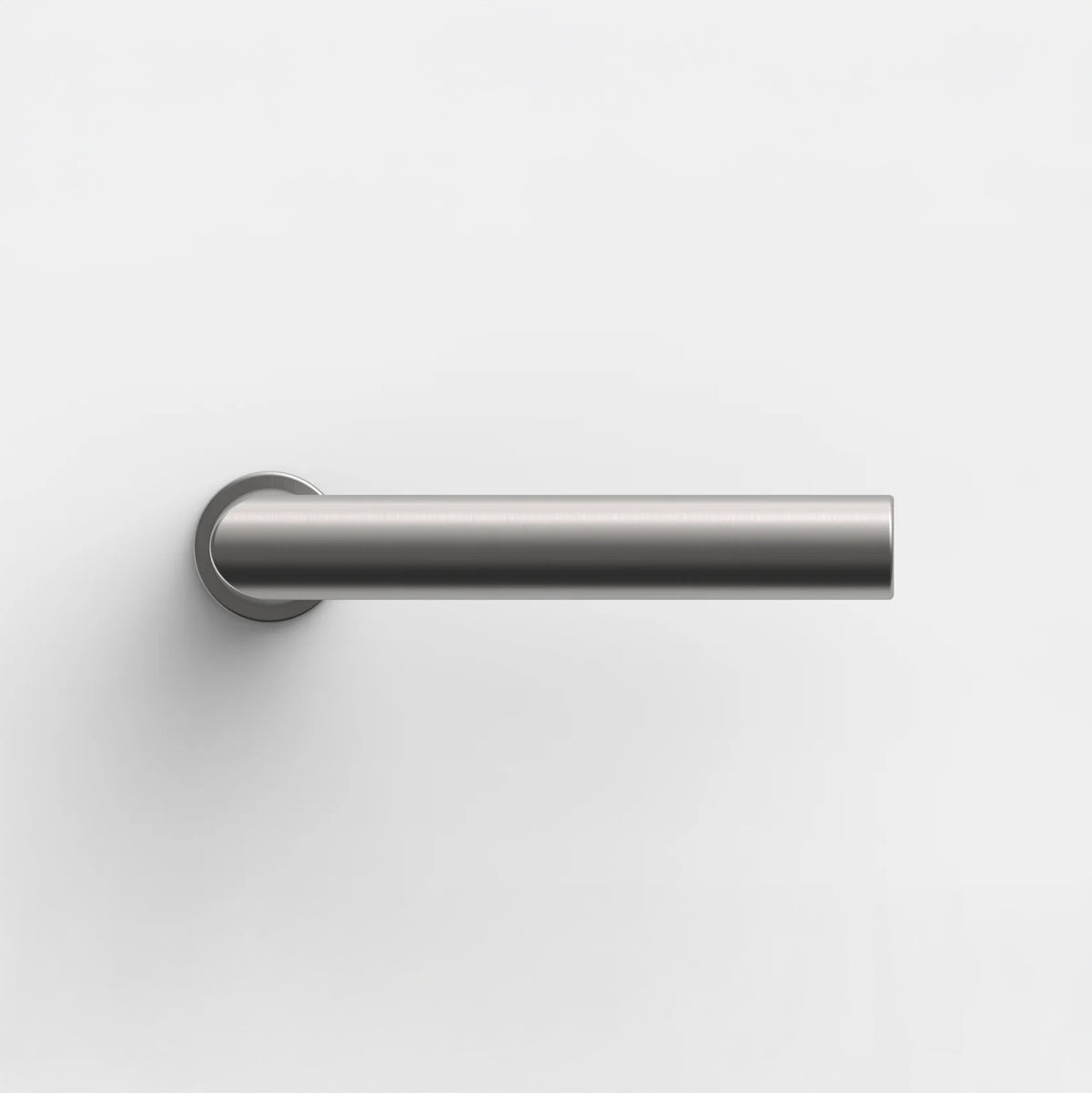 Satin stainless steel FSB 1076 door lever in profile against a pale wall, showing the square section of the grip.