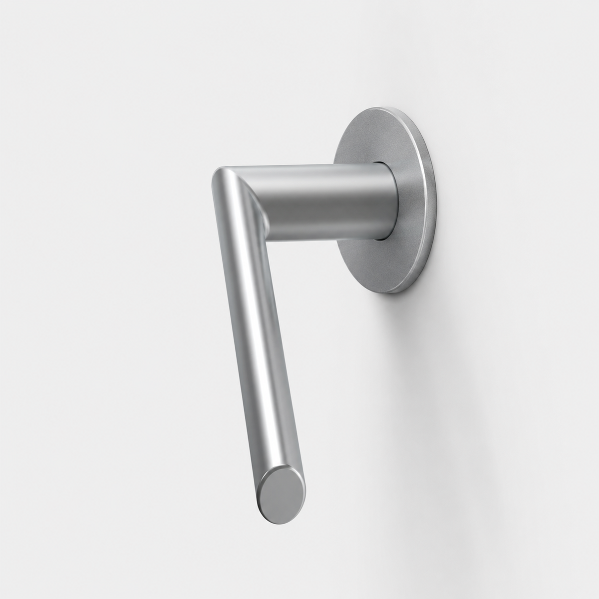 FSB 1108 matte silver door lever with a round neck and ergonomic mitred grip on a circular rose against a white wall.
