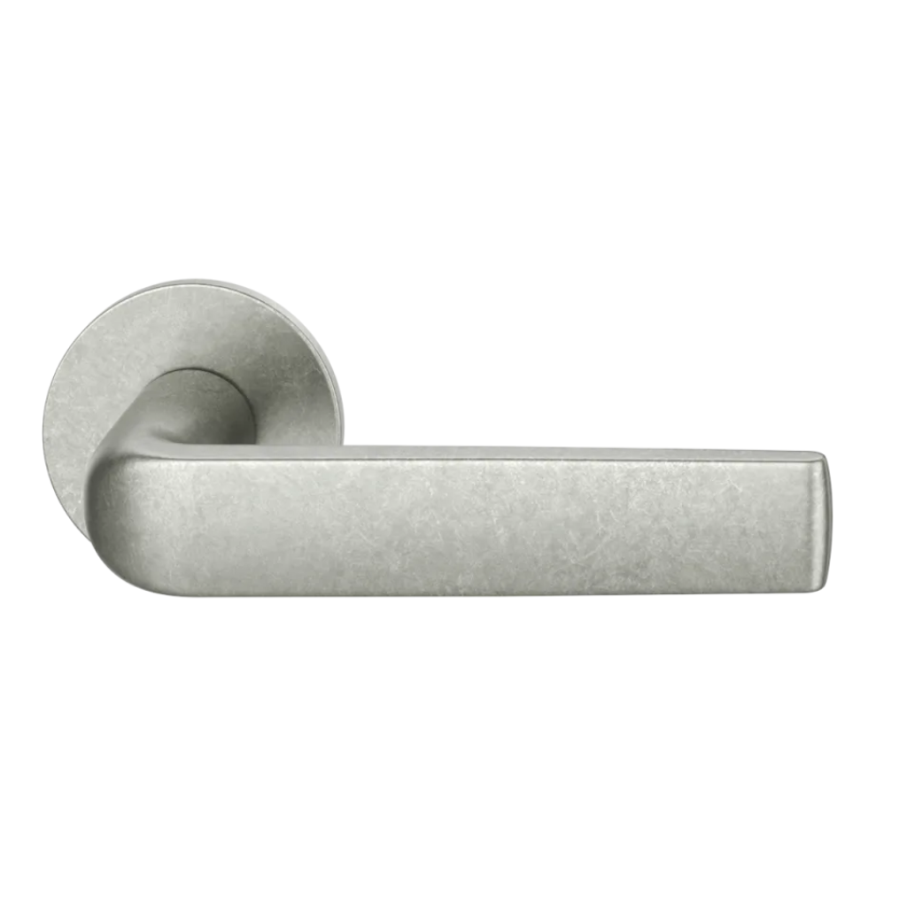 Aluminum pure natural FSB 1267 door lever, a flat-grip lever on a round rose.