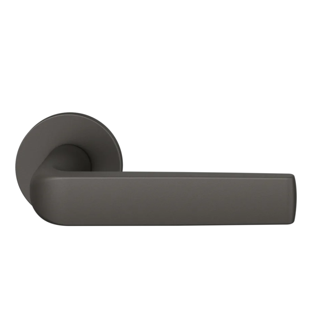 Dark bronze anodized FSB 1267 door lever, a flat-grip lever on a round rose.