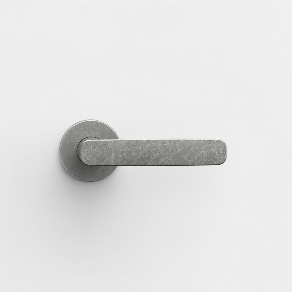 FSB 1289 brushed metal door lever with a flat, ergonomic design on a circular rose against a plain white background.