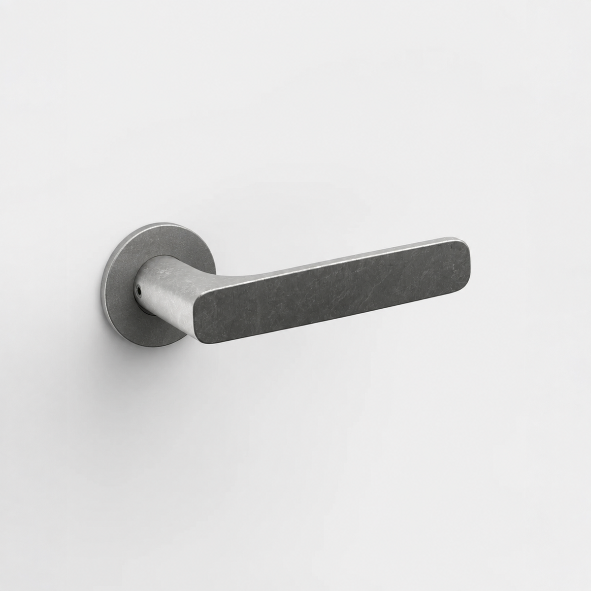 FSB 1289 matte silver door lever with a flat front and convex grip on a circular rose against a plain white background.
