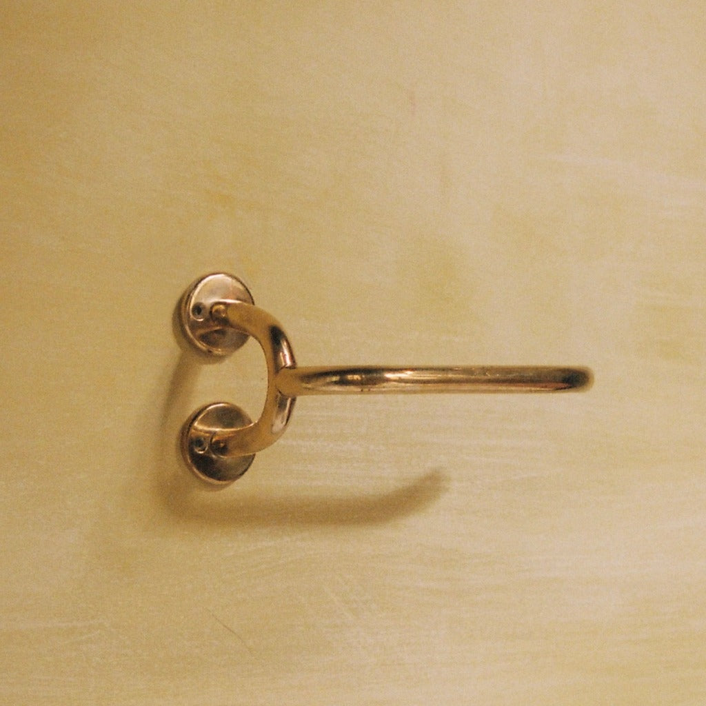 Brass Maha Alavi Fauna toilet paper holder, an organic cast bracket.