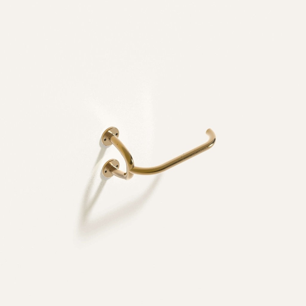 Brass Maha Alavi Fauna toilet paper holder, an organic cast bracket.