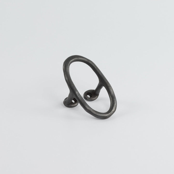 Carbon Black casting Libre Forme No. 7 wall hook, cabinet pull, or curtain tie back designed as Jewelry hardware collection by Mi&Gei Edition.