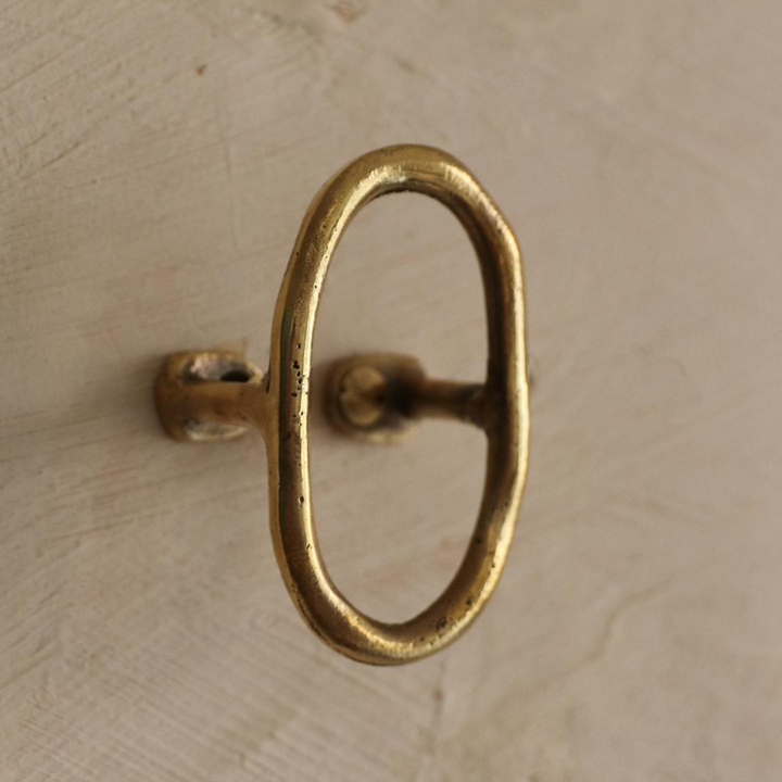 Brass casting Libre Forme No. 7 wall hook, cabinet pull, or curtain tie back designed as Jewelry hardware collection by Mi&Gei Edition.