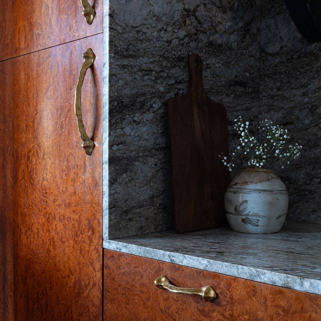 Mi & Gei Forme No. 41 large and No. 29 small cabinet pulls displayed together on a kitchen island.